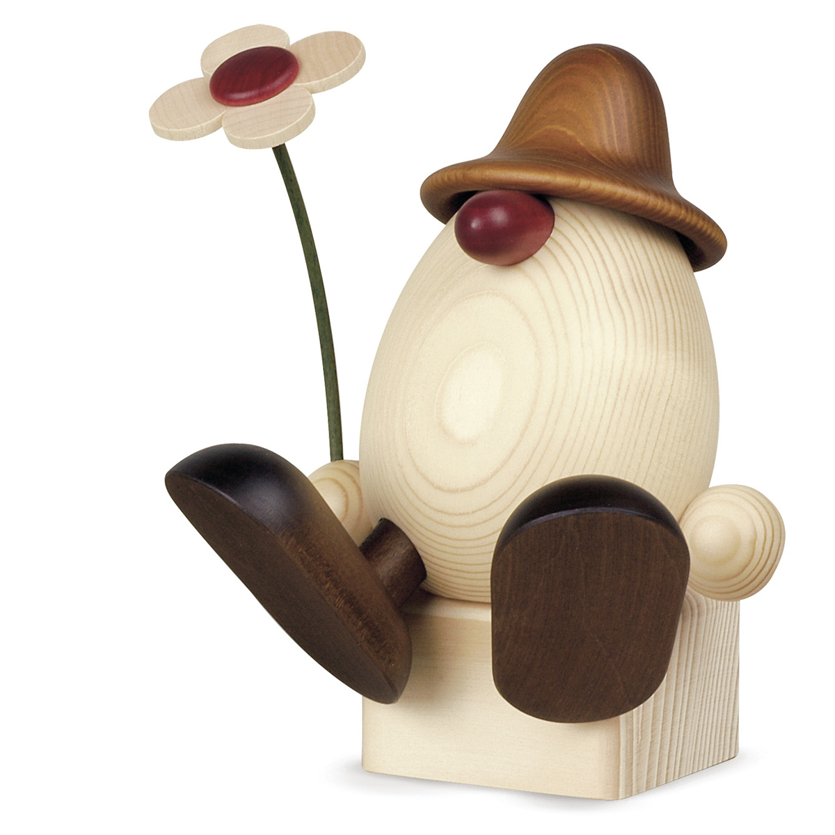 Eierkopf Vater Anton mit Blume auf Kante sitzend, braun