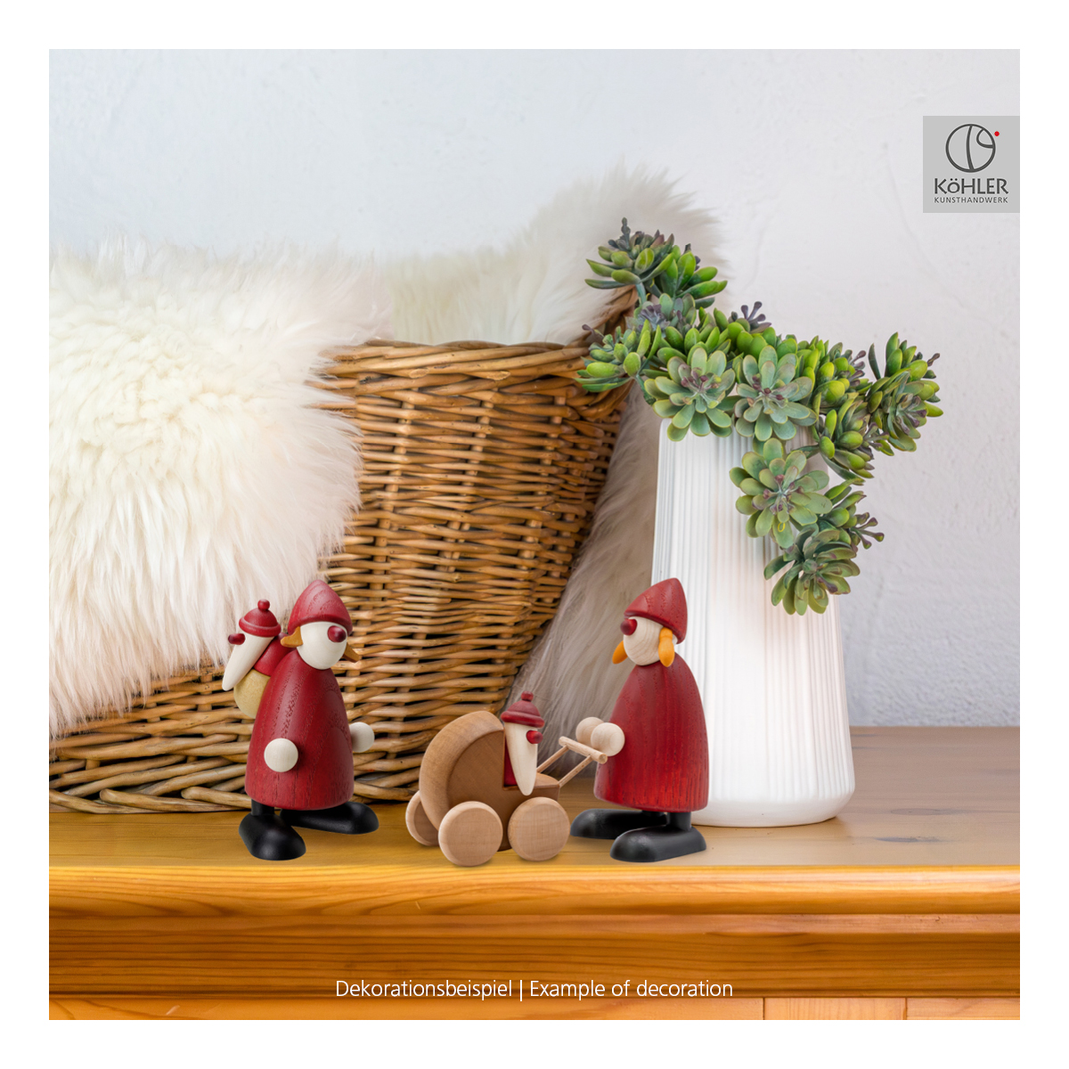 Weihnachtsfrau mit Kinderwagen