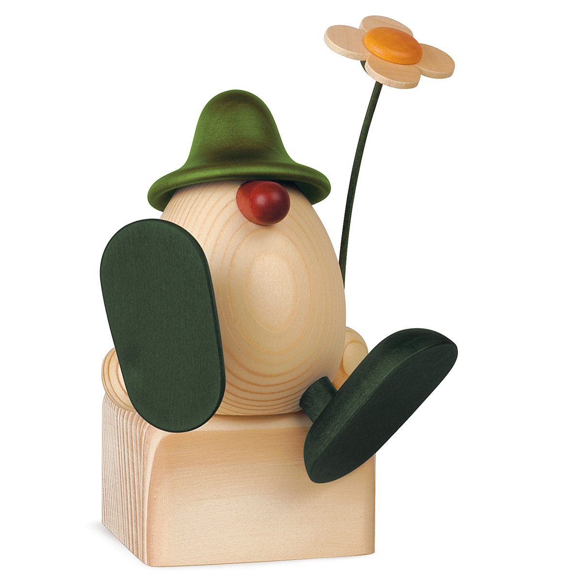 890B_gruen_lb Eierkopf Alfons mit Blume auf Kante sitzend/tanzend, grün (ohne Klotz)