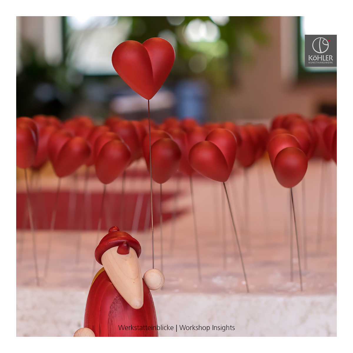 Santa Claus holding a heart, small