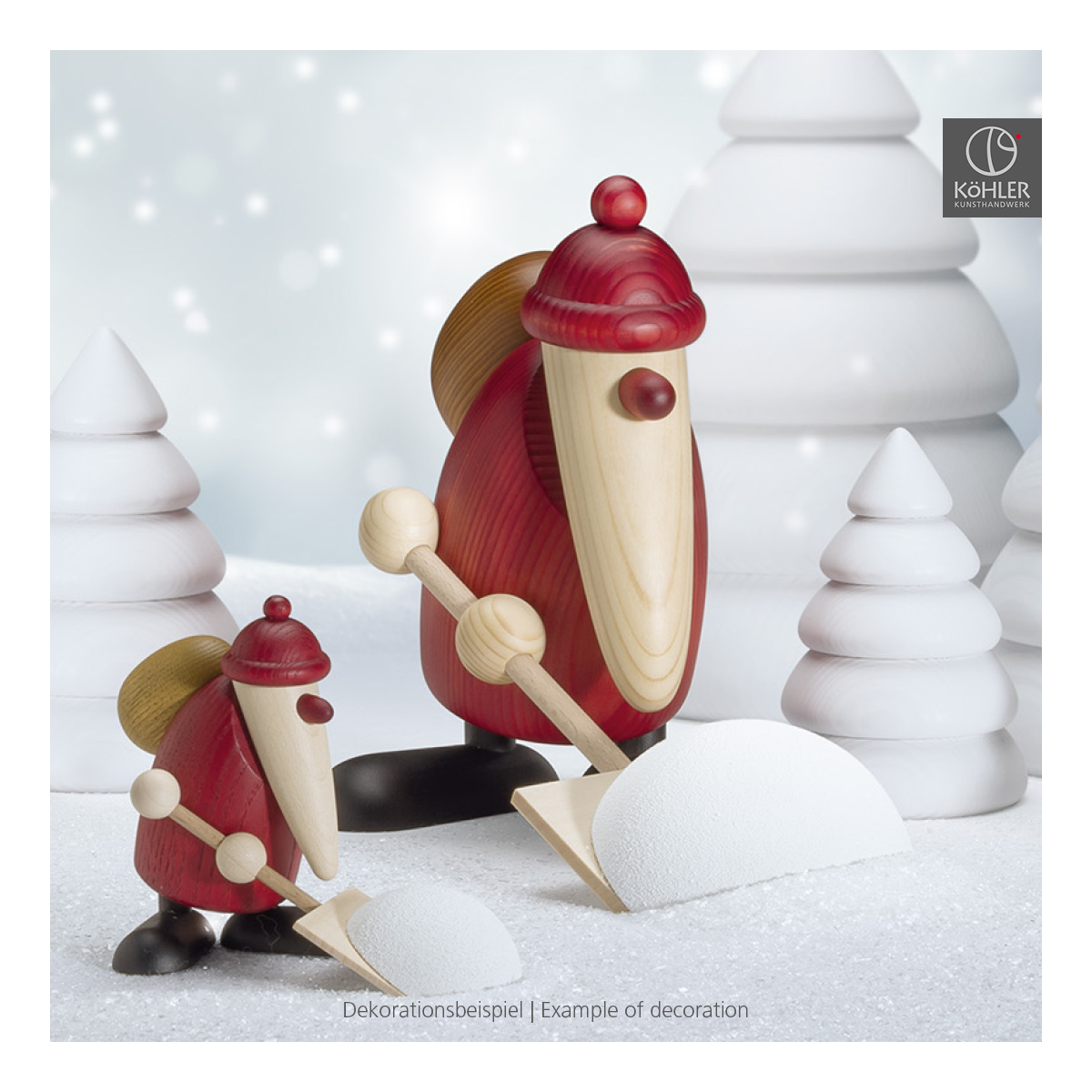 Santa Claus holding a snow shovel, small