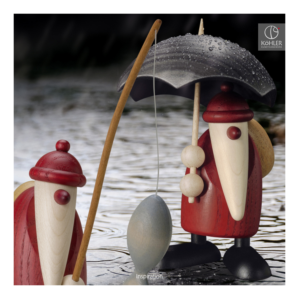 Santa Claus holding an umbrella, small
