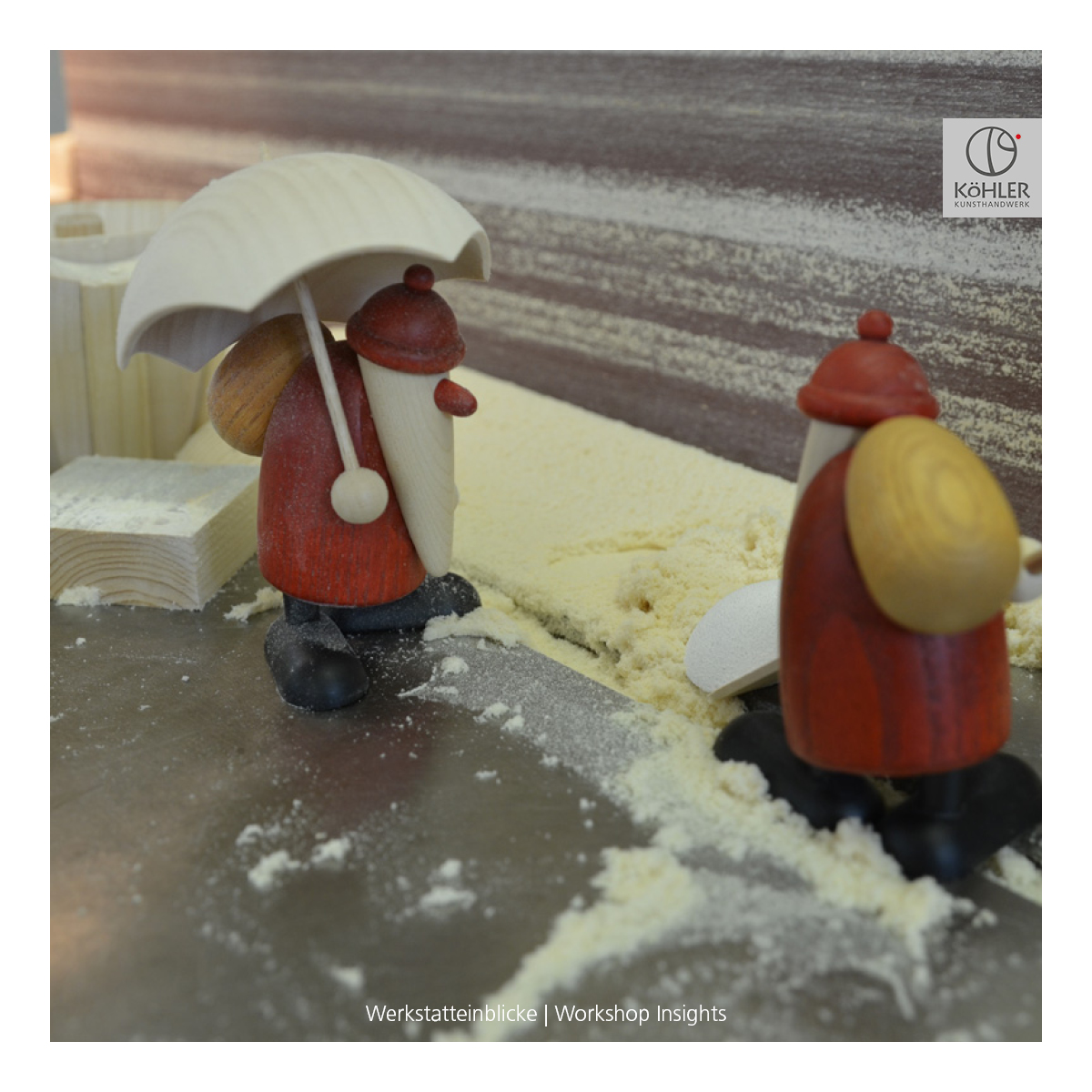 Santa Claus holding an umbrella, small