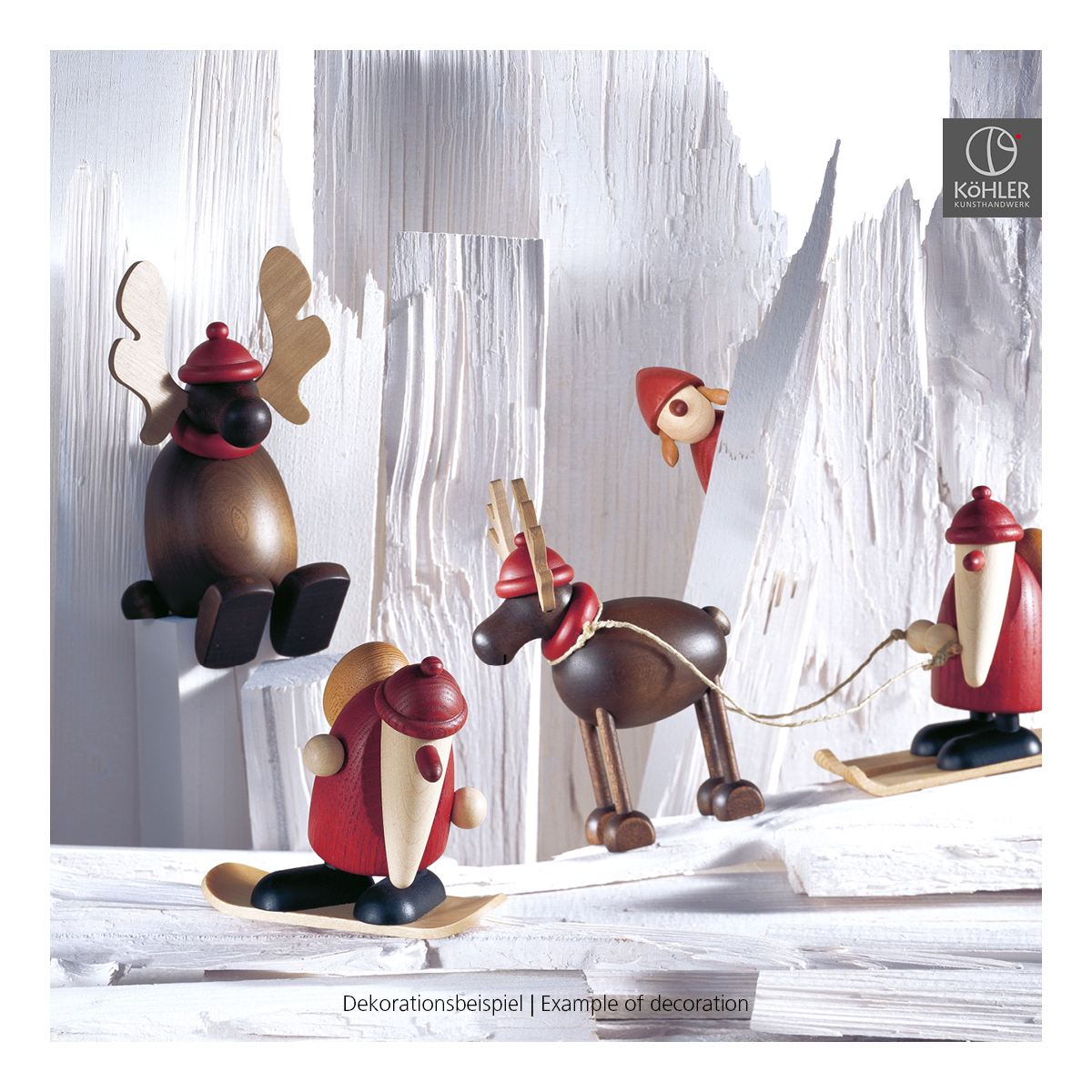 Rentier Rudolf mit Weihnachtsmann auf Ski, klein